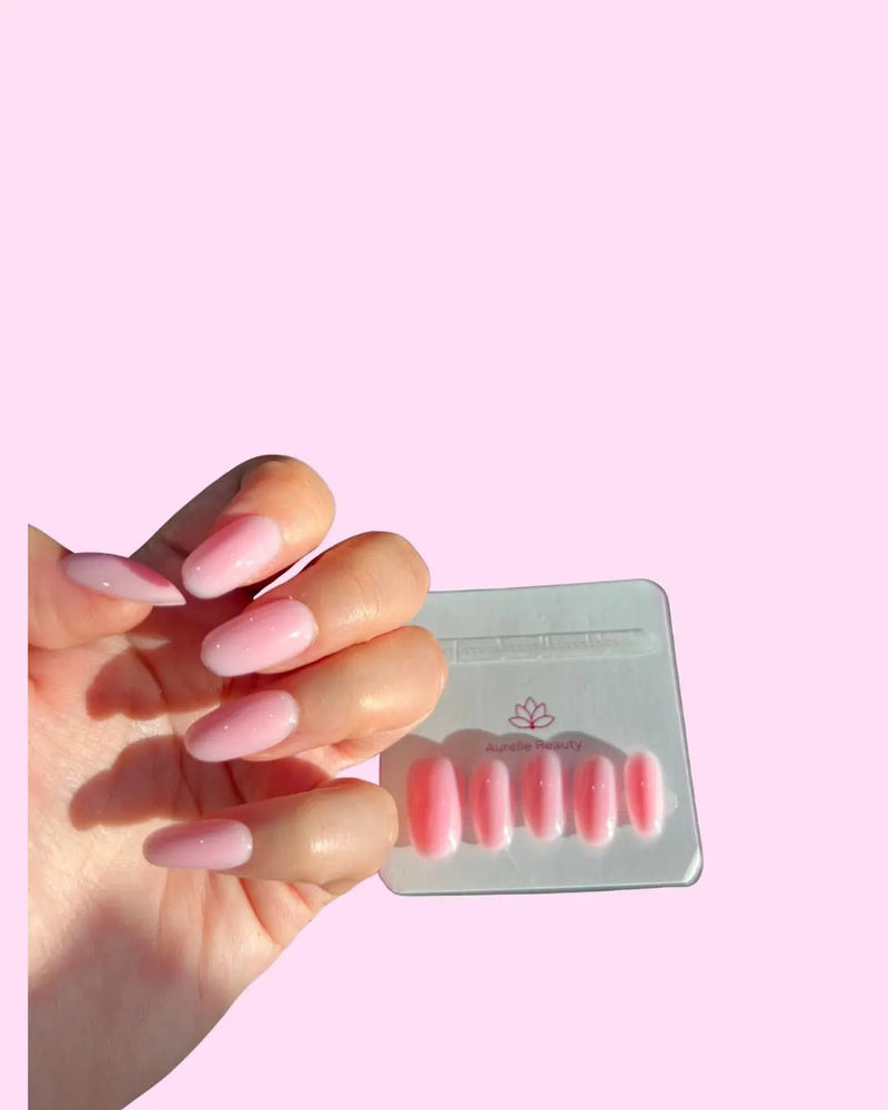 Hot Pink BIAB Press-On Nails on hand with pack