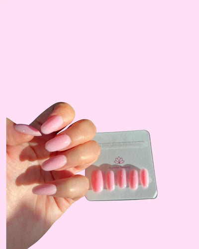 Hot Pink BIAB Press-On Nails on hand with pack