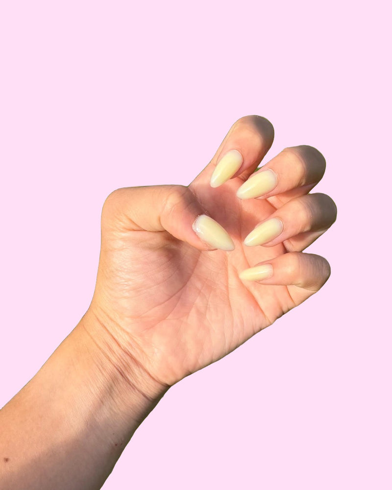 Yellow BIAB press on nails, close-up of glossy almond nails - Aurelle Beauty